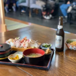 Unique Japanese seafood dishes in London being prepared by a skilled chef.
