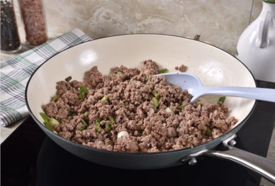 Seasoned ground beef being cooked for bibimbap.