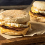 Breakfast sandwich with bulgogi beef, egg, and cheese, showcasing a Korean-American fusion breakfast idea.
